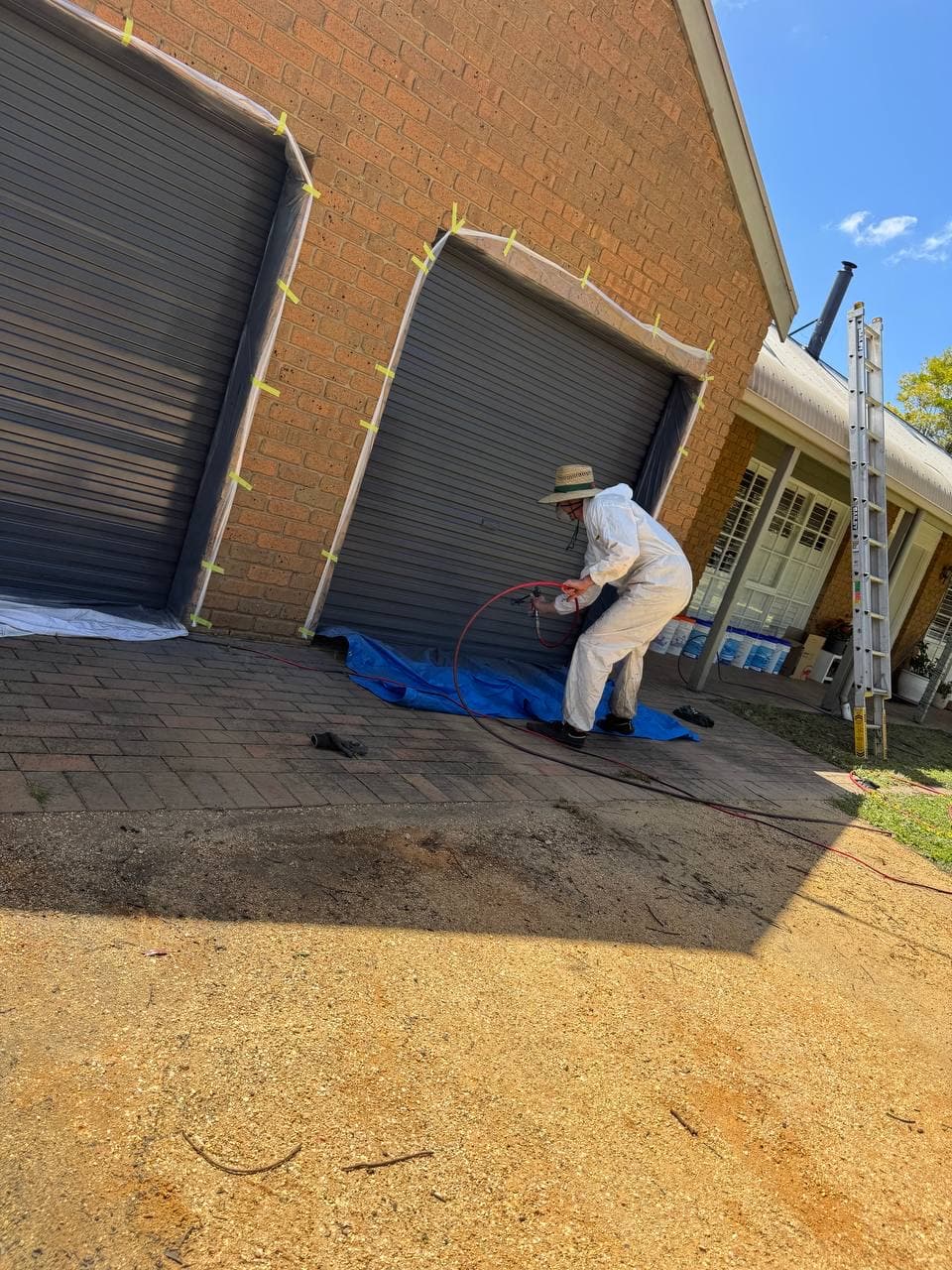 Roof painting preparation masking gutters – Skyways Roofing