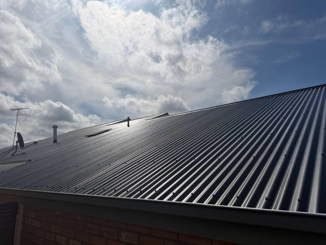 Completed metal re-roofing project in Sunbury by Sky Ways Roofing